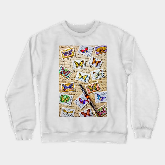 Butterfly stamps and old document Crewneck Sweatshirt by photogarry